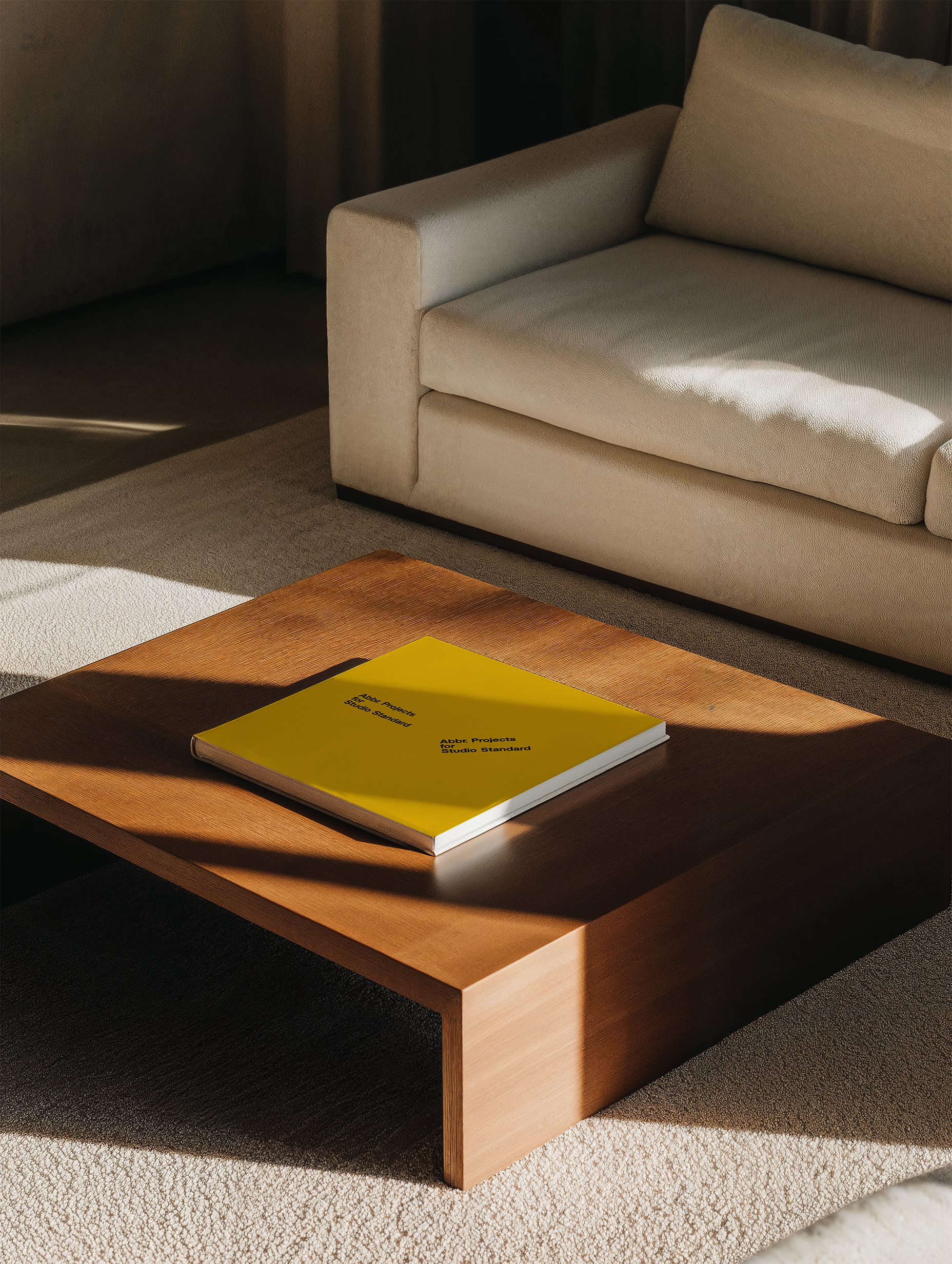 Retail mockup of a yellow book resting on a wooden coffee table beside a beige sofa in a warm interior