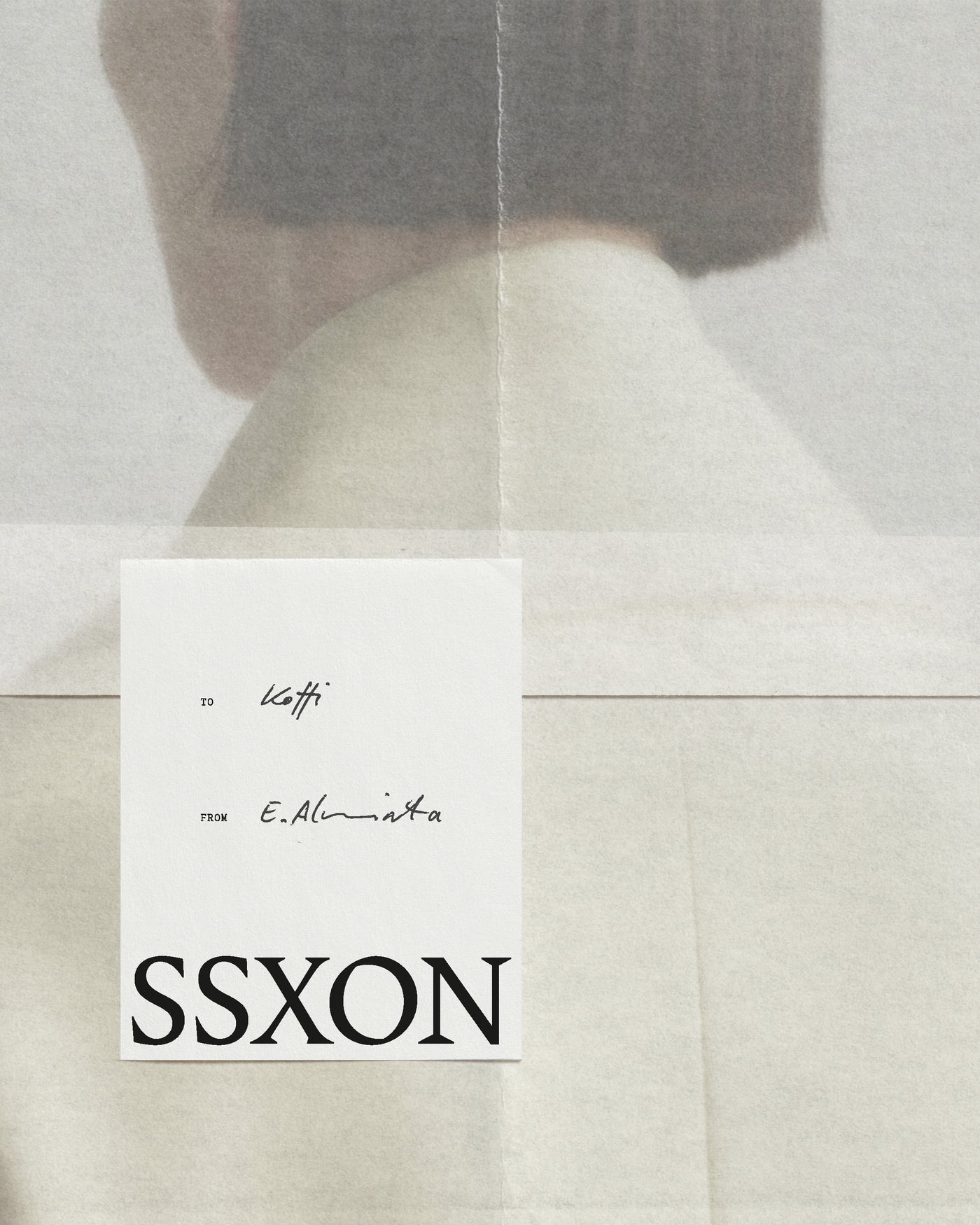 Lookbook mockup with folded paper texture, a blurred portrait, and a handwritten SSXON correspondence card