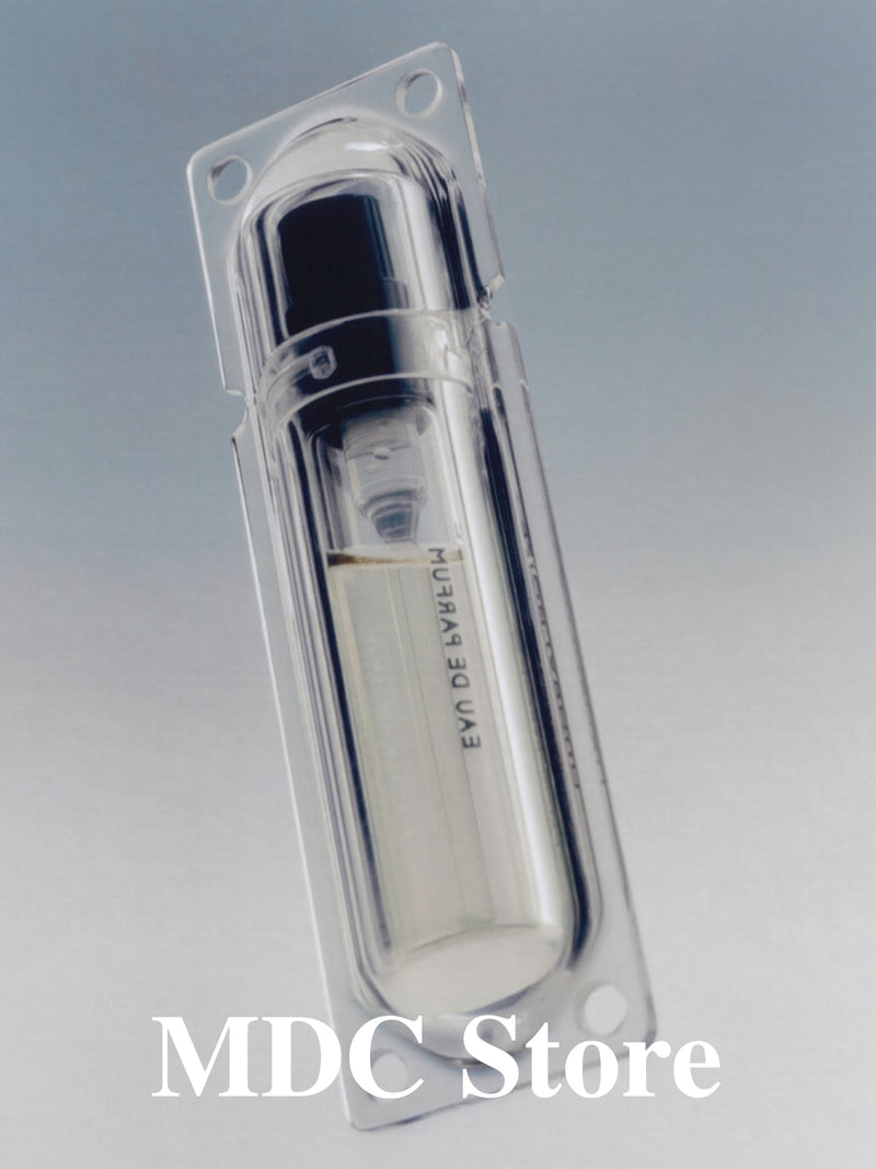 MDC Store eau de parfum in a clear blister pack, product image art directed by Lisa Fessl
